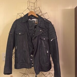 J. Lindenberg dark teal leather jacket.